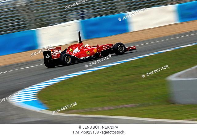 Finnish Formula One driver Kimi Raikkonen of Ferrari steers the new F14 T during the training session for the upcoming Formula One season at the Jerez racetrack...