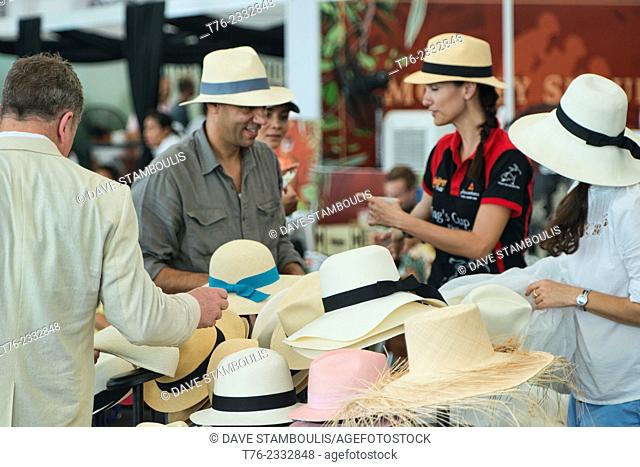 Panama hat seller at the King's Cup Polo Tournament in Bangkok, Thailand
