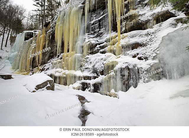Pitcher Falls during the winter months in Albany, New Hampshire USA. This waterfall is located next to Champney Falls along Champney Falls Trail