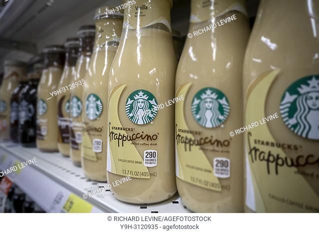 Bottles of Starbucks Frappuccino coffee are seen on a supermarket shelf in New York on Friday, May 4, 2018. Nestlé is reported to be in talks to purchase...
