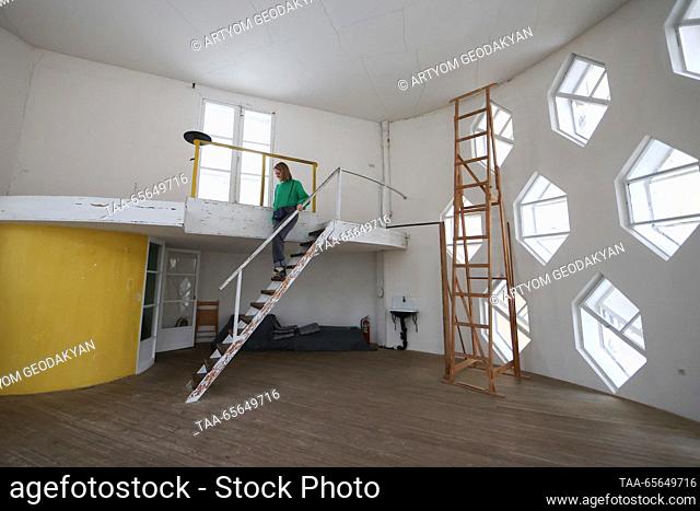 RUSSIA, MOSCOW - DECEMBER 11, 2023: A woman visits the Melnikov House, a state museum dedicated to Soviet architect Konstantin Melnikov (1890-1974) and his son