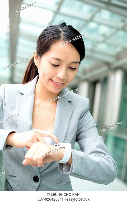 Business woman use of smart watch