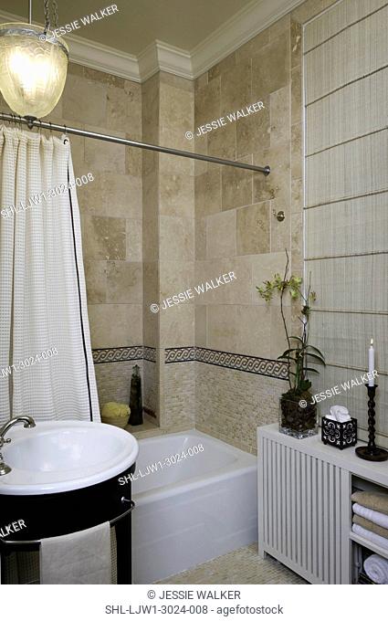 BATHROOM: Neutral tiled walls, mosaic tile beneath border, crown moulding, natural blinds, shower curtain, partial round sink, pendant light