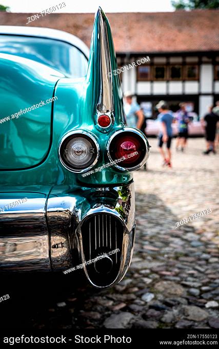 DIEDERSDORF, GERMANY - AUGUST 21, 2021: The stoplight of luxury car Cadillac Series 62 Coupe de Ville, 1953. Close-up. The exhibition of