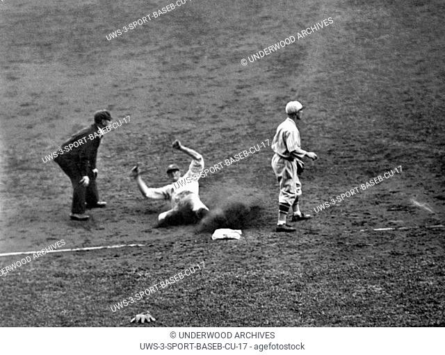 New York, New York: October 5, 1928 Yankee left fielder Bob Meusel slides safely into third base in the seventh inning of the second game of the World Series at...