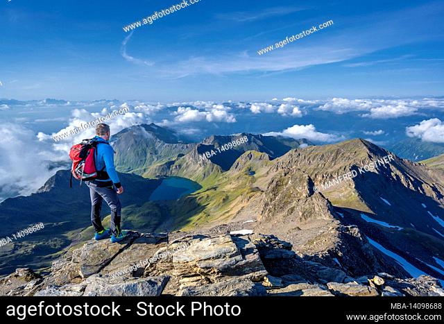 vals, mühlbach, bolzano province, south tyrol, italy. view down from the summit of the wilder kreuzspitze to the wilder see
