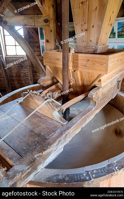 Ramloese, Denmark - June 19, 2016: Moving Millstone in historic windmill on the Danish Windmill Day 2016