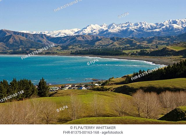 View of settlement, bay and mountain range, South Bay, Seaward Kaikoura Mountains, Kaikoura, South Island, New Zealand