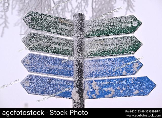 23 January 2023, Thuringia, Oberhof: The signposts in the center of Oberhof are frosted. New snow fell in the Thuringian Forest over the weekend and it is...