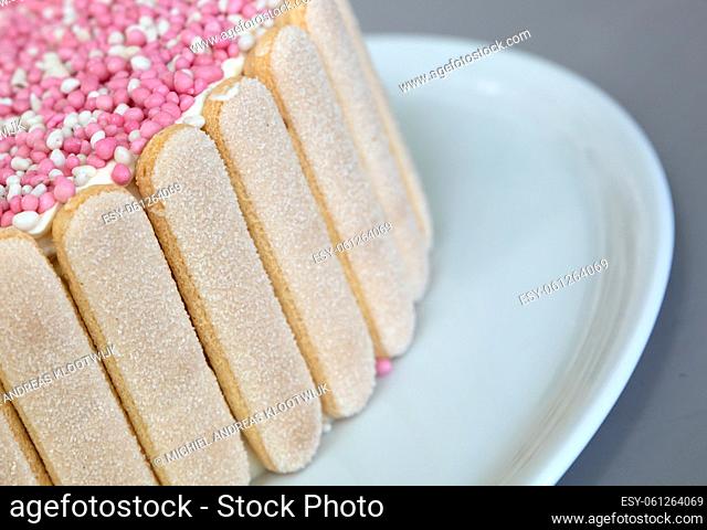 Typical Dutch mouse rusk with pink mice on a cake, for baby girl shower
