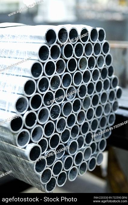 30 March 2022, Baden-Wuerttemberg, Rottweil: Welded threaded pipes lie in a steel trade. In addition to the price jumps for materials such as steel