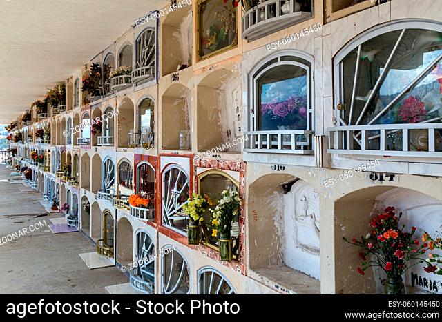 Huaraz, Peru - October 01, 2015: Aligned graves on the local cemetery