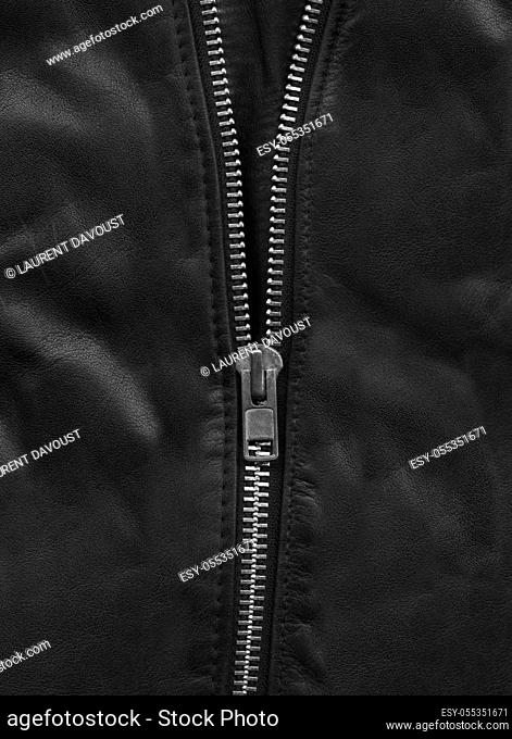 Black leather jacket close-up view. Texture Background