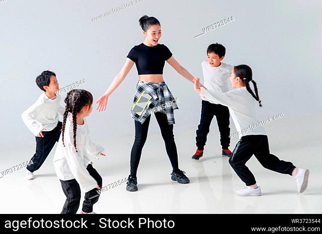 Happy pupils learn how to dance