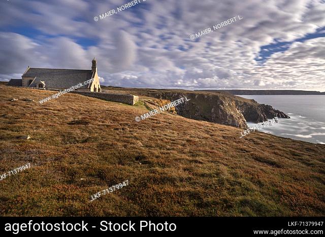 The Pointe du Van with the Chapelle Saint-They (17th century) on a stormy September day, Cornouaille, Brittany, France, Europe
