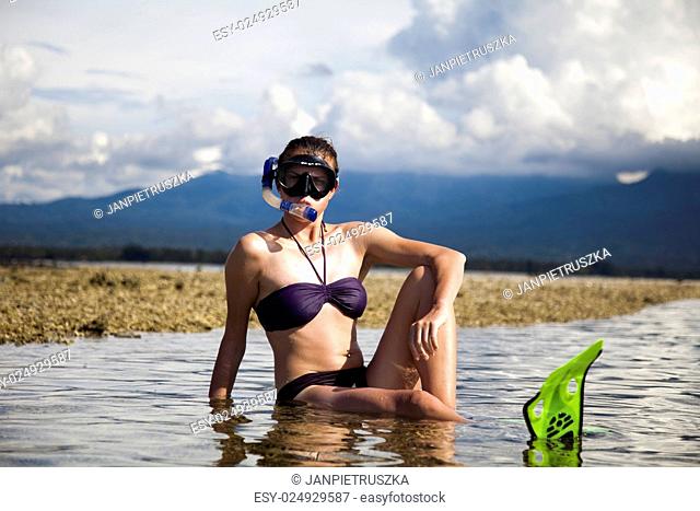 Island woman and diving, bright colorful vivid theme