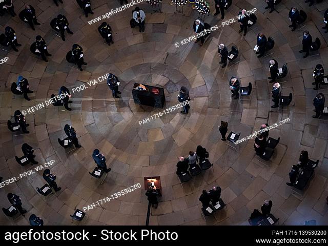 A prayer is read for Capitol Hill Police Officer Brian Sicknick during his memorial service in the Rotunda of the U.S. Capitol Building in Washington