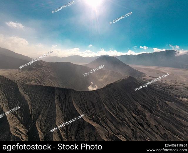 Cinematic shot aerial drone view of Mount Bromo crater edge in East Java, Indonesia