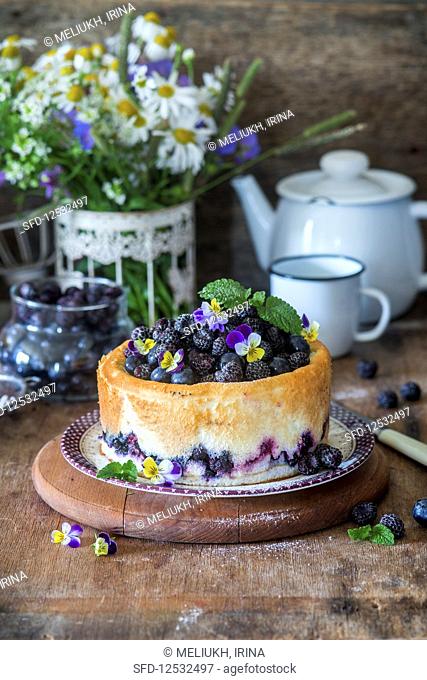 Cream cheese cake with blackberries and blueberries