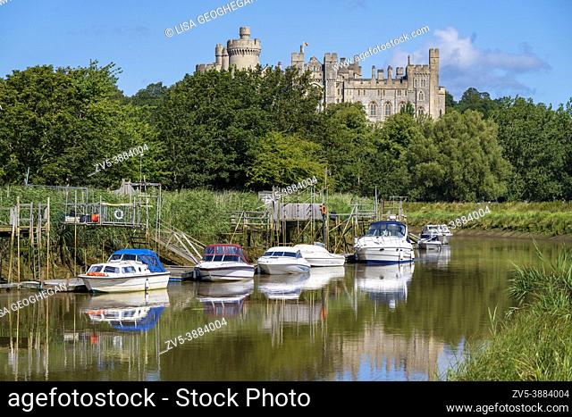 Arundel Castle and boats on the River Arun, Arundel, West Sussex, England, Uk