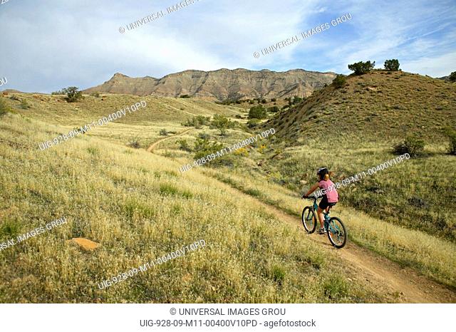 Young Girl 8 Mountain Biking On The Trails Near Fruita, Colorado