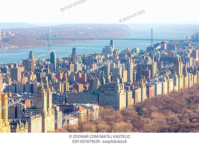 Panoramic elevated view of Central Park, Upper West Side and the George Washington Bridge with Hudson River in Fall. Manhattan, New York City, USA