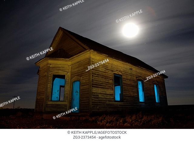 Abandoned Taiban Presbyterian Church in New Mexico at night with star trails