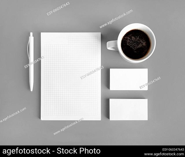 Blank branding identity set on gray paper background. Corporate stationery template. Top view. Flat lay