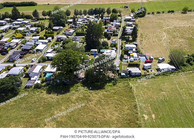 04 July 2019, North Rhine-Westphalia, Lügde: An aerial photo of the camping site Eichwald in Lügde, taken with a drone. The police search the campsite in Lügde...