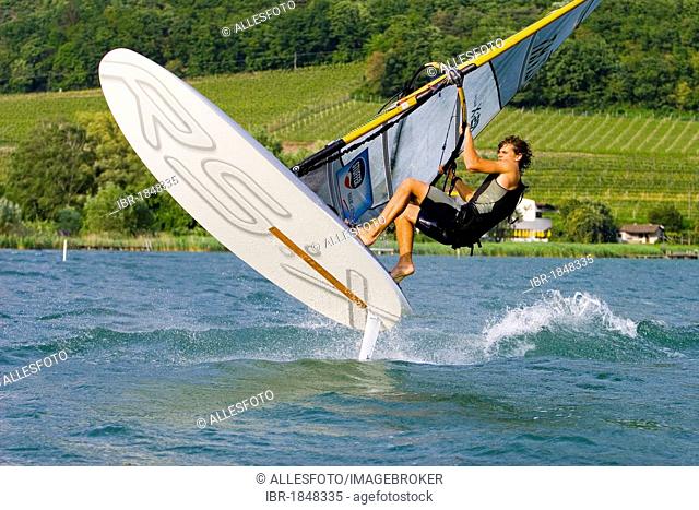 Wind surfer surfing on Lake Kaltern, Province of Bolzano-Bozen, Italy, Europe