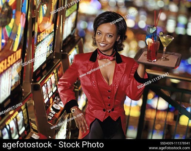 Waitress with cocktails in casino