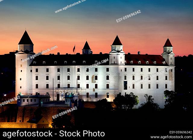 Bratislava Castle (Bratislavsky Hrad) illuminated at dusk in Slovakia, Europe