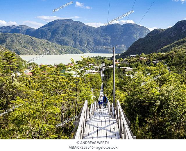 Panorama view over Houses and wooden boardwalk of Caleta Tortel, sea in the background, Aysen region, Patagonia, Chile