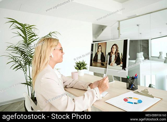 Businesswoman having a video call at desk in office