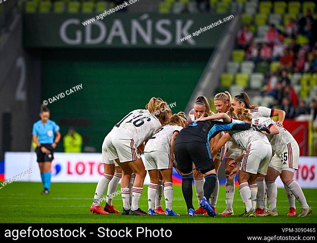 belgian players getting together ahead of the first half of a soccer game between Belgium's national team the Red Flames and Poland