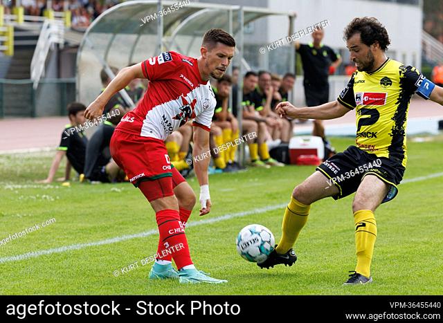 Essevee's Alessandro Ciranni and KSV Oudenaarde's Jesse Martens fight for the ball during a friendly game between KSV Oudenaarde and first division soccer team...