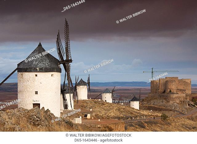 Spain, Castile-La Mancha Region, Toledo Province, La Mancha Area, Consuegra, antique La Mancha windmills, dawn