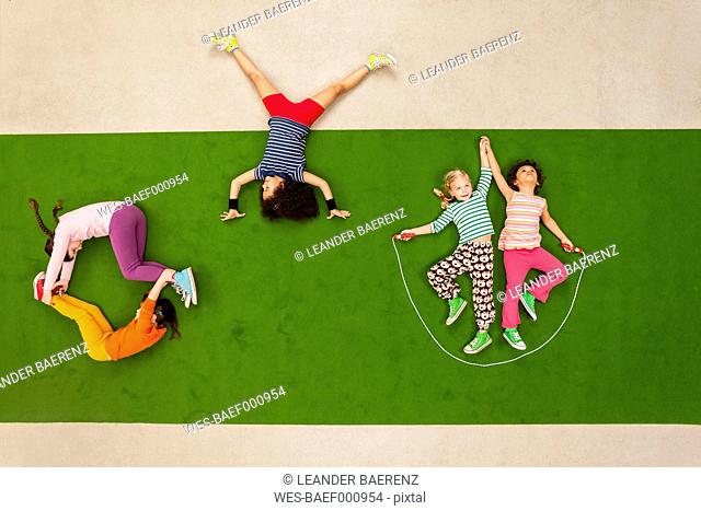 Children exercising in park