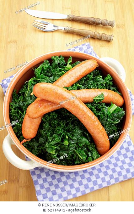 Fresh steamed kale with Mettwurst sausages