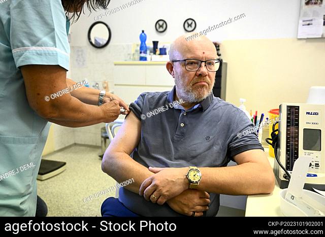 Health Minister Vlastimil Valek (TOP 09) gets vaccinated against COVID-19 and influenza in Prague, Czech Republic, October 19, 2023