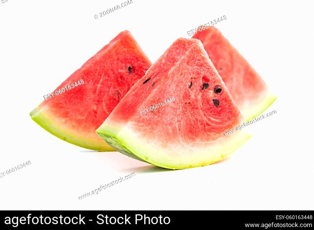 Red sliced watermelon. Pieces of red melon isolated on white background
