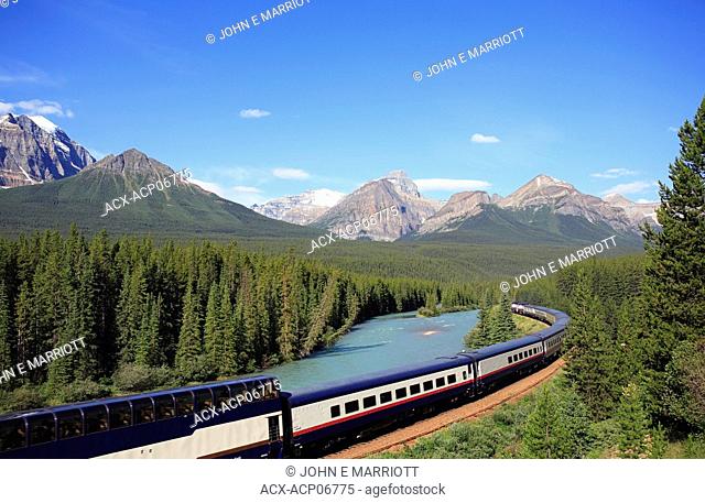 The Rocky Mountaineer tourist passenger train at Morant's Curve on the CPR line along the Bow River near Lake Louise in Banff National Park, Alberta, Canada
