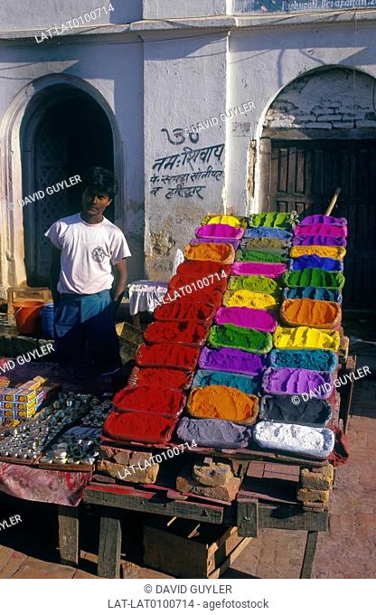Pashupatinath. Stall in road. Brightly coloured tika dyd powders on display