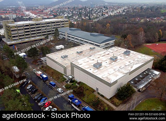 01 December 2020, Hessen, Eschwege: View of the gymnasium of the upper secondary school, in which a vaccination centre is being set up (aerial view with a...