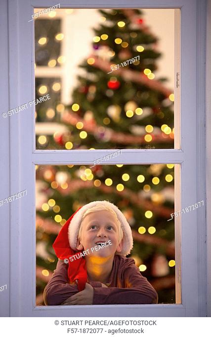 Young boy waiting for santa claus
