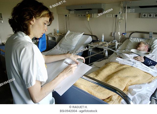 ELDERLY HOSP. PATIENT WITH NURSE<BR>Photo essay from hospital. Patient and nurse.<BR>Hospital of Reims, in the French region of Champagne-Ardenne