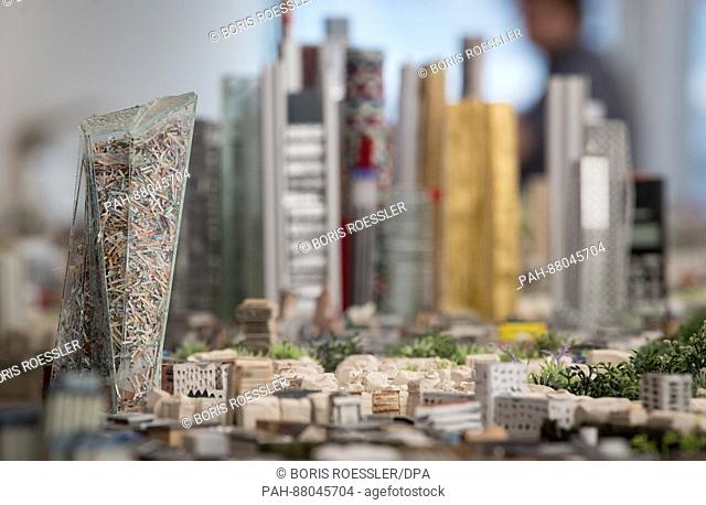 The plexi glas reconstruction of the European Central Bank is filled with shredded bank notes in the new model of the city of Frankfurt, Germany
