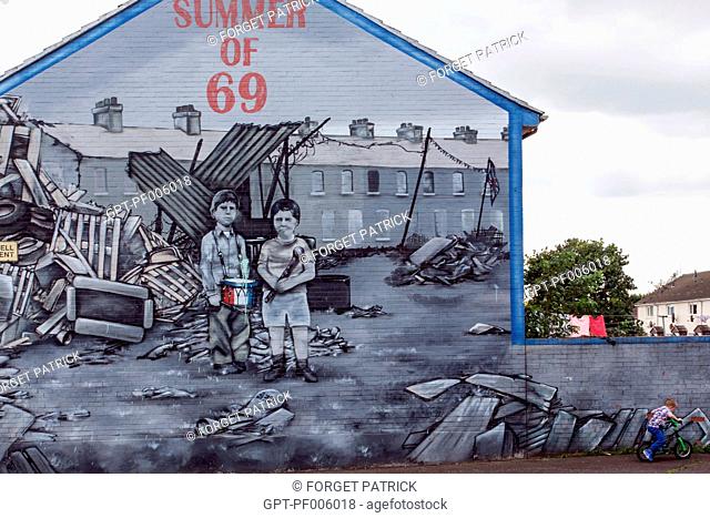 CHILD ON A BICYCLE, MEMORIES OF THE NORTHERN IRELAND RIOTS IN THE SUMMER OF 1969, MURALS ON THE WALLS OF HOUSES ON SHANKILL ROAD, HOPEWELL AVENUE