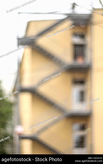 fire escape on the facade of a house, abstract blur