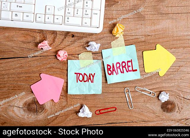 Hand writing sign Barrel, Internet Concept cylindrical container bulging out in the middle made of wooden staves Display of Different Color Sticker Notes...